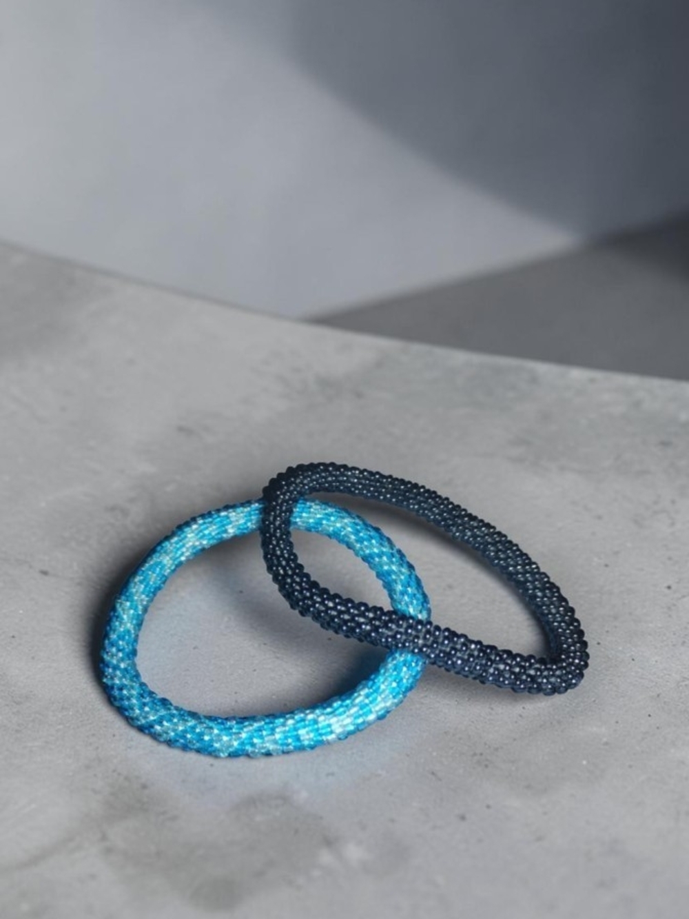 NWOT Nepal Glass Bead Crochet Roll-On Bracelets - Set of 2 Navy & Teal Blue